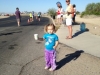 Gracie volunteering to hand out water